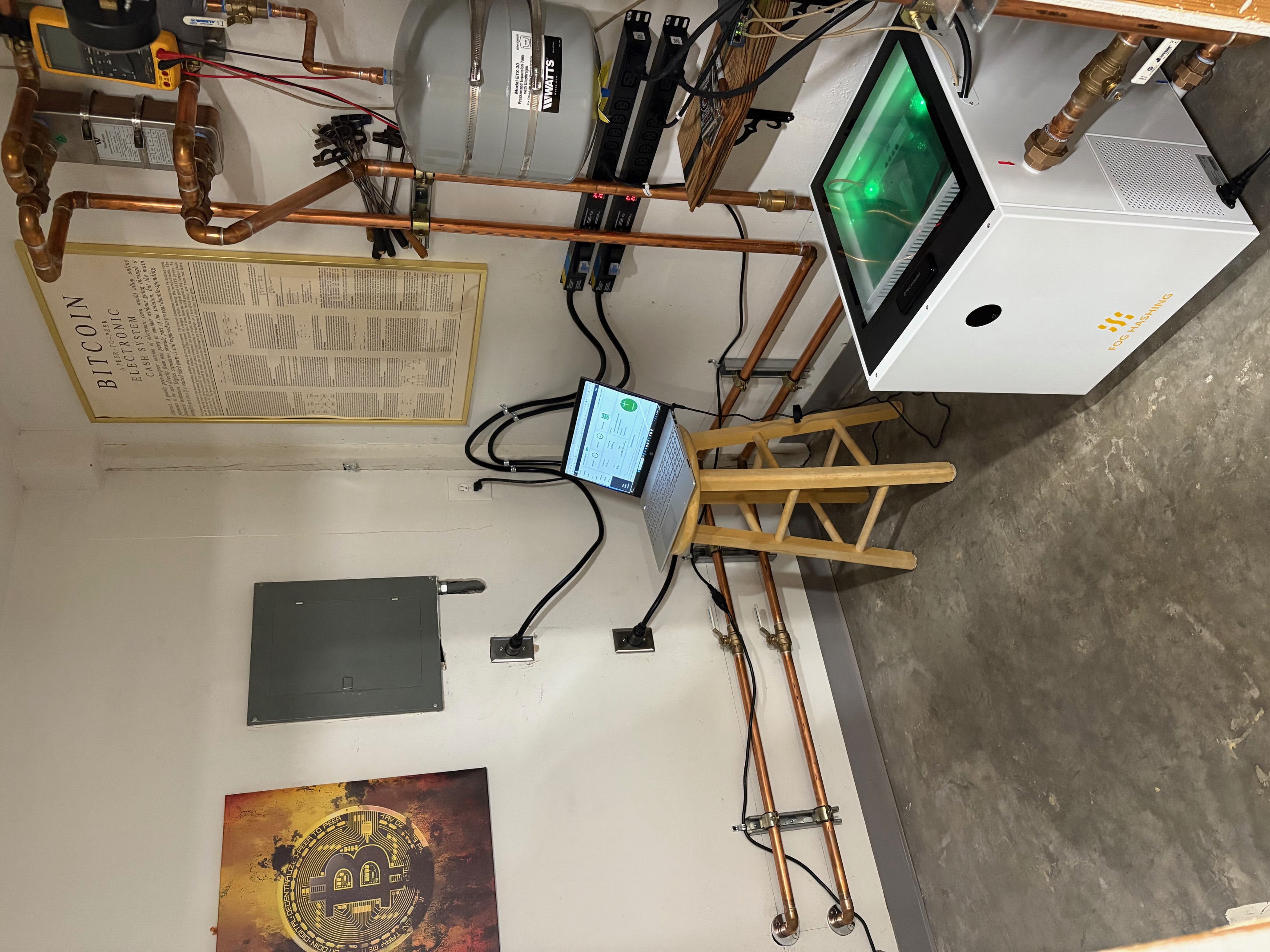 RSG shop heating system — immersion-cooled miner heating radiant concrete slab via copper glycol loop